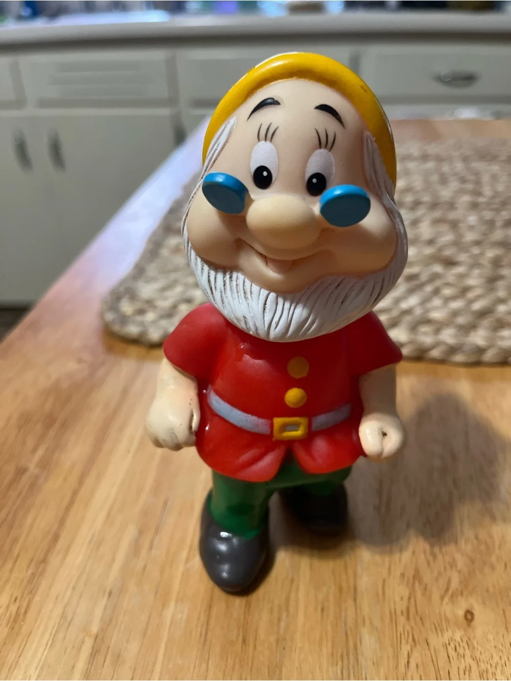 Disney Doc Figurine in Red Coat and Yellow Hat